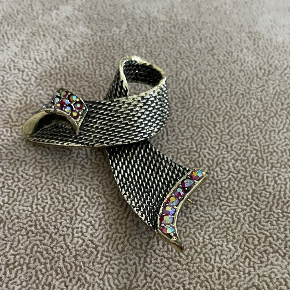 Elegant BSK Black and Gold Brooch with Gem Accents